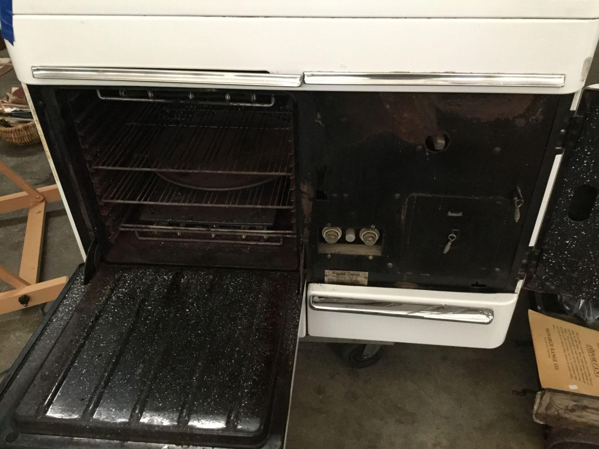 Vintage mid century Monarch FH188W iron range oven w/ manual, good condition. sold as is