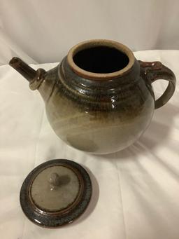 Nice handmade ceramic stoneware tea pot with lid, signed by artist , approx. 9 x 11 in.