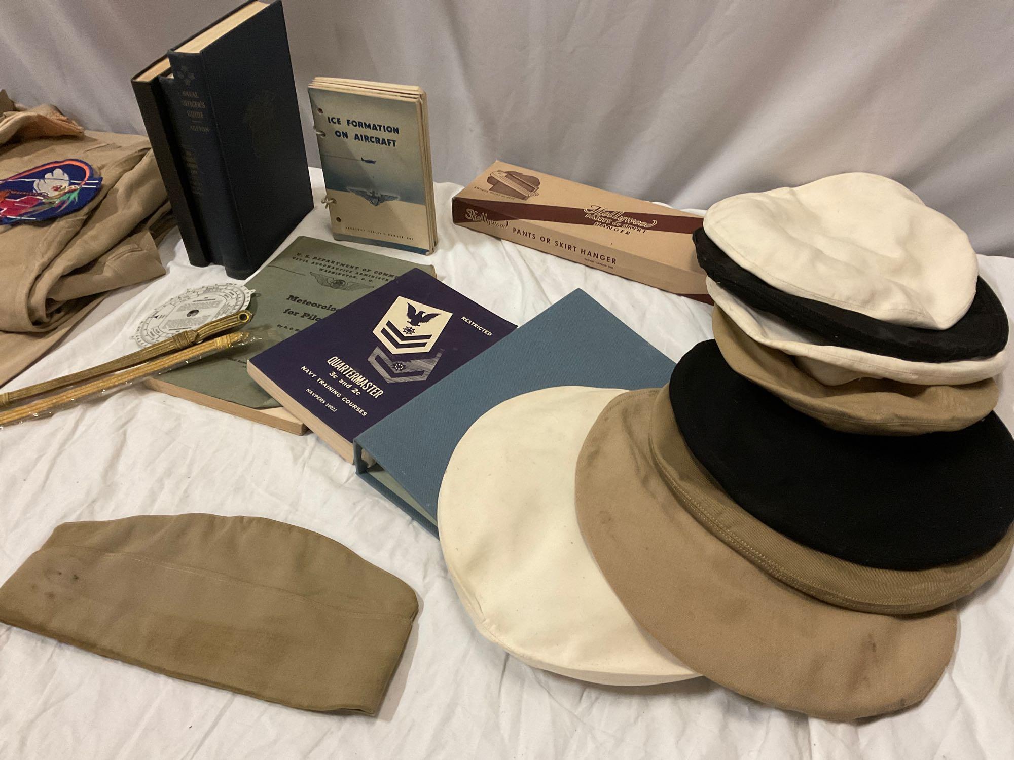 Lot of antique pilot flight uniform, headset, books, booklets, berets, gloves, & more. See pics.