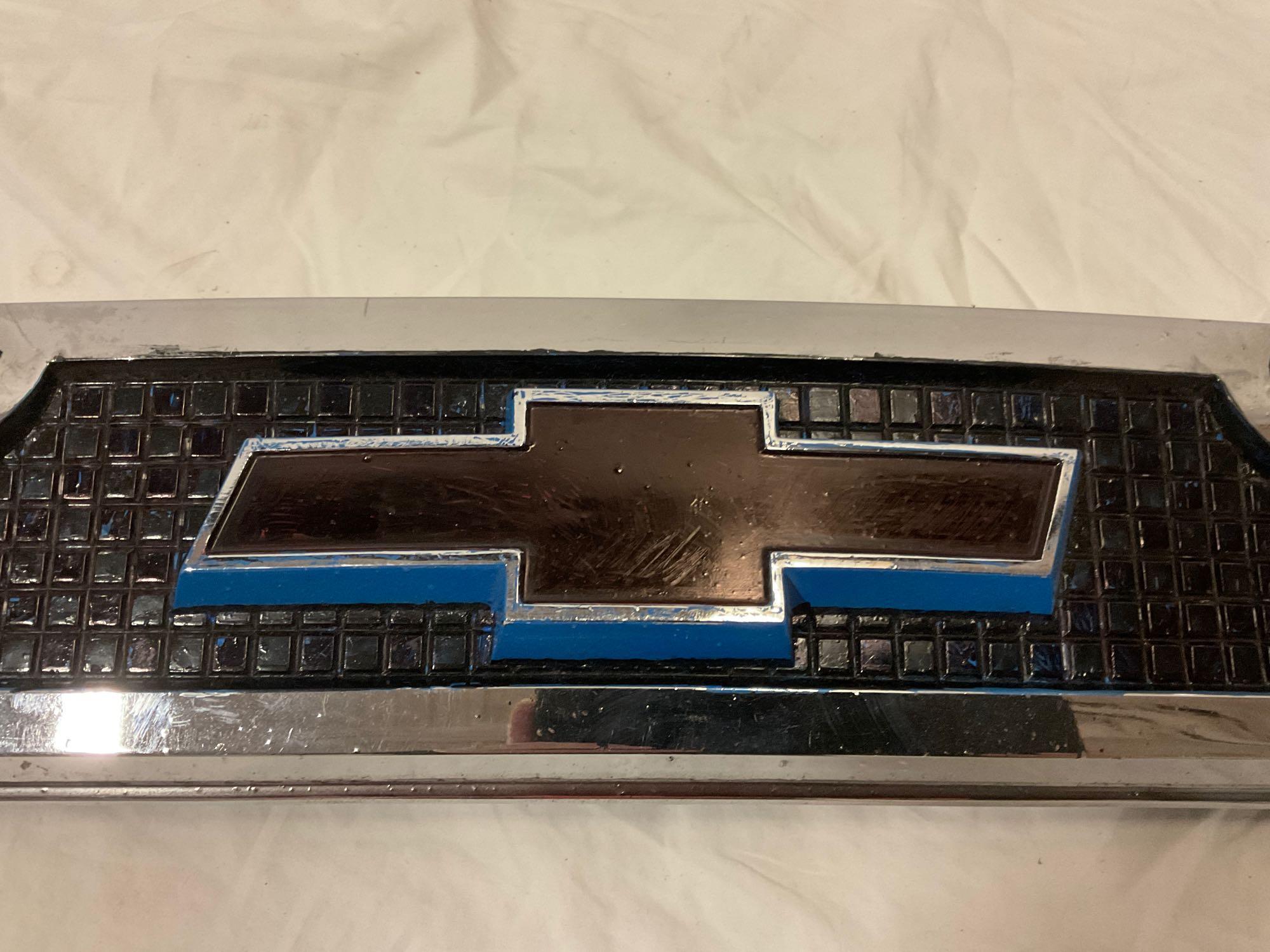 Vintage CHEVROLET Chevy automobile chrome grill , sold as is. Approx 37 x 4 in.