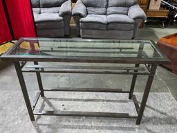 Very attractive and modern dark brown brushed metal hallway or sofa table w/ glass top