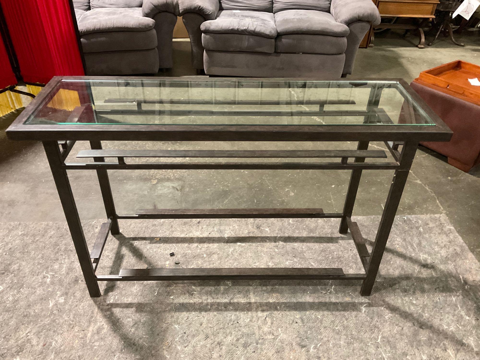 Very attractive and modern dark brown brushed metal hallway or sofa table w/ glass top