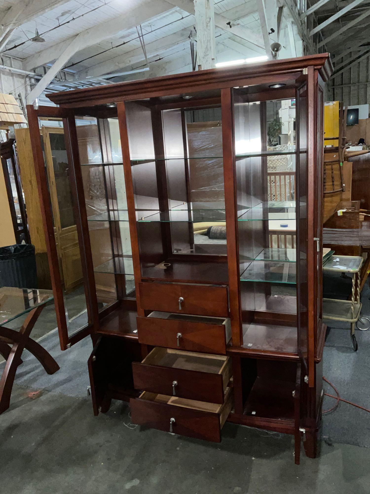 Sleek Modern lighted ,mirrored back curio display hutch with removable glass shelves