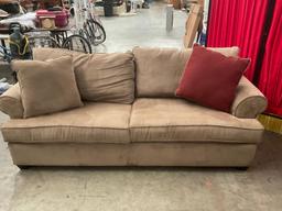 Very nice brown sofa and loveseat combination with reversible pillows, by pacific furniture Oregon