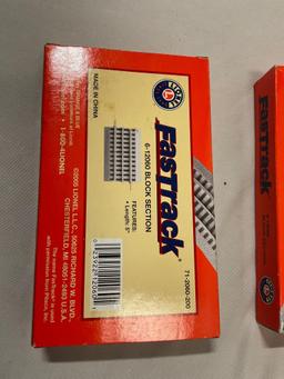 4 pc. lot of Lionel FASTRACK block section train track pieces in box