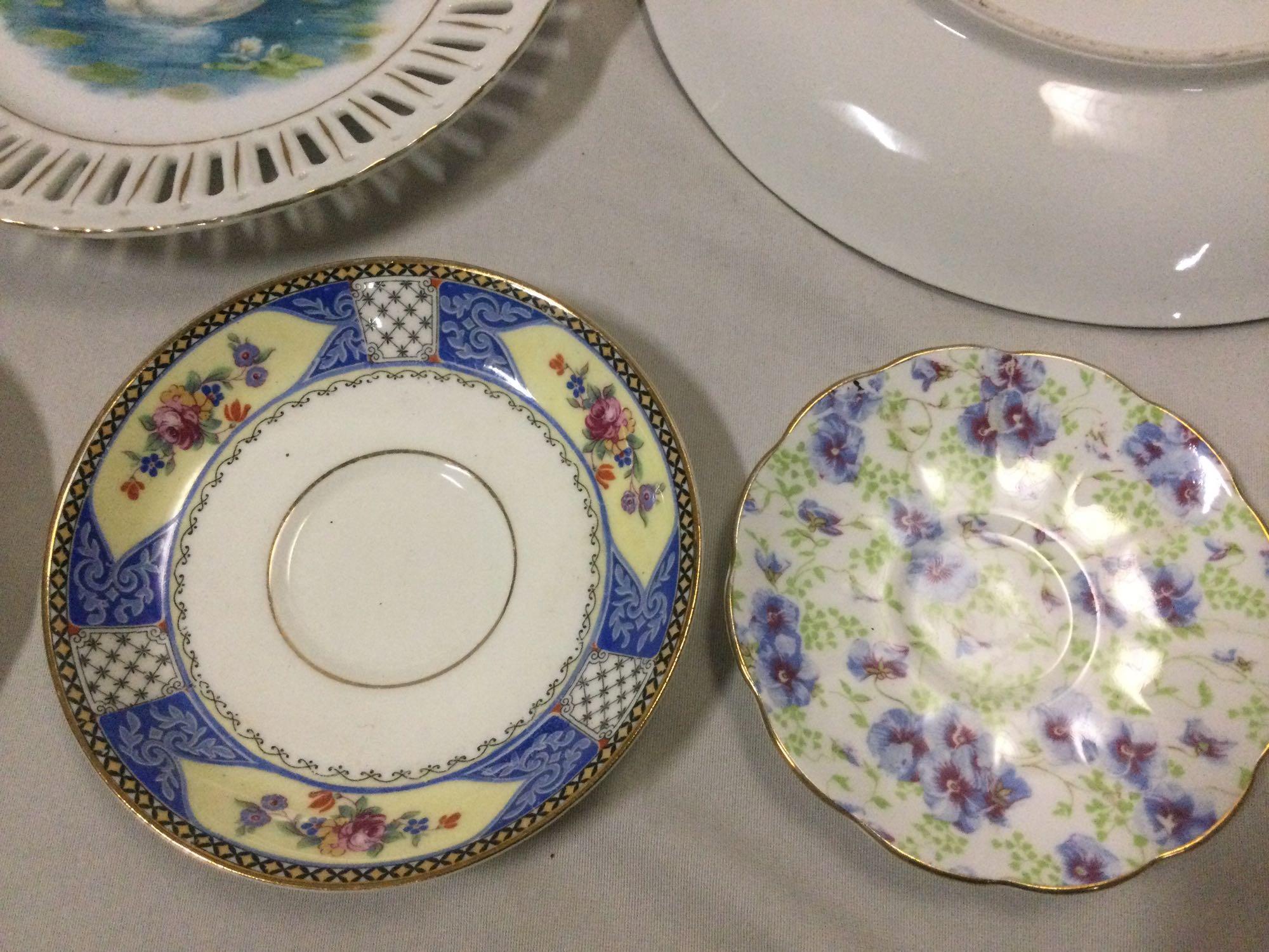 Large lot of vintage/antique porcelain tableware, cups, saucers, plates, bowls, shows wear, see