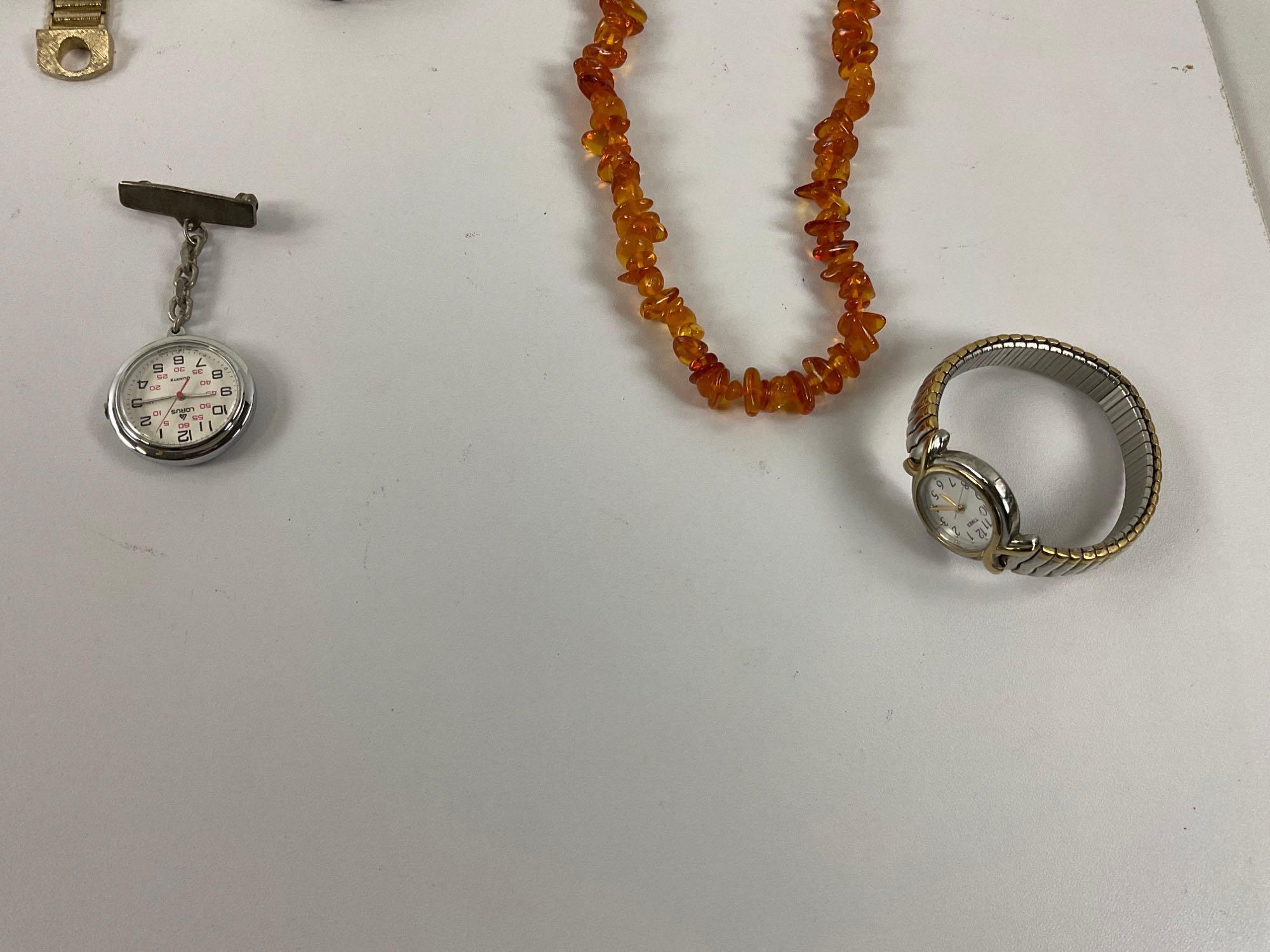 collection of assorted estate jewelry including amber necklace & ring