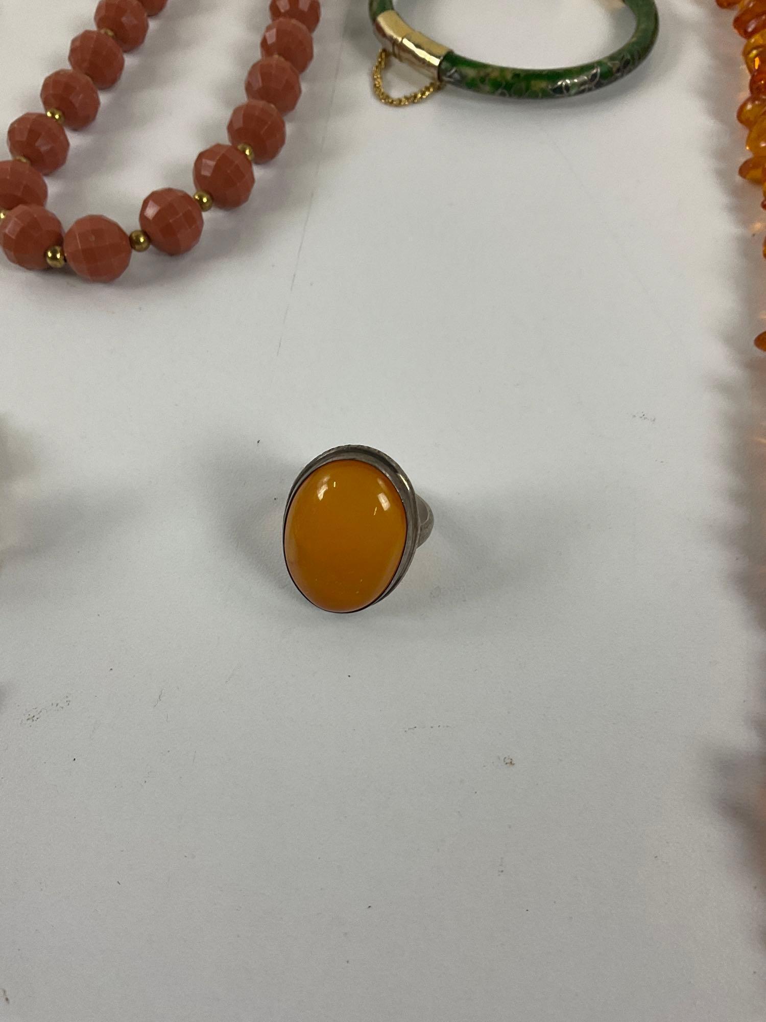 collection of assorted estate jewelry including amber necklace & ring