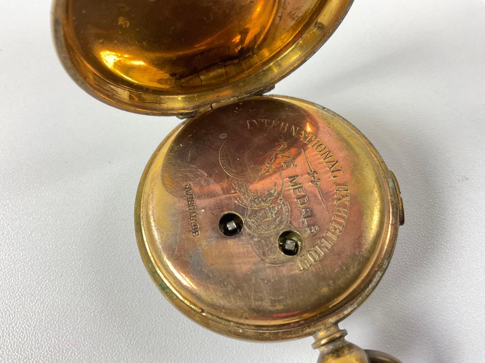 Brass Cased Doctors Sweep Seconds pocket Watch with small crack in crystal.