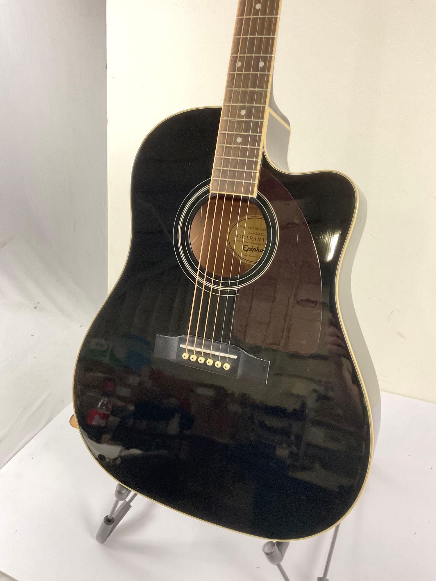 Immaculate Epiphone AJ acoustic/electric guitar comes with foldable guitar stand