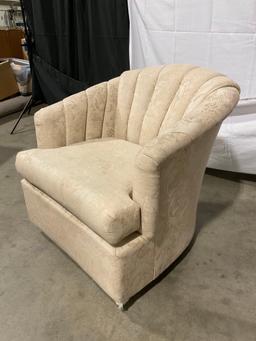 Beige half-barrel chair with floral upholstery pattern by BEST CHAIRS, INC.