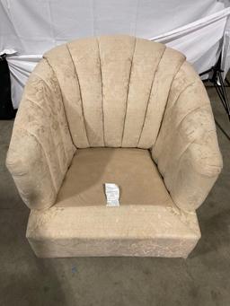 Beige half-barrel chair with floral upholstery pattern by BEST CHAIRS, INC.