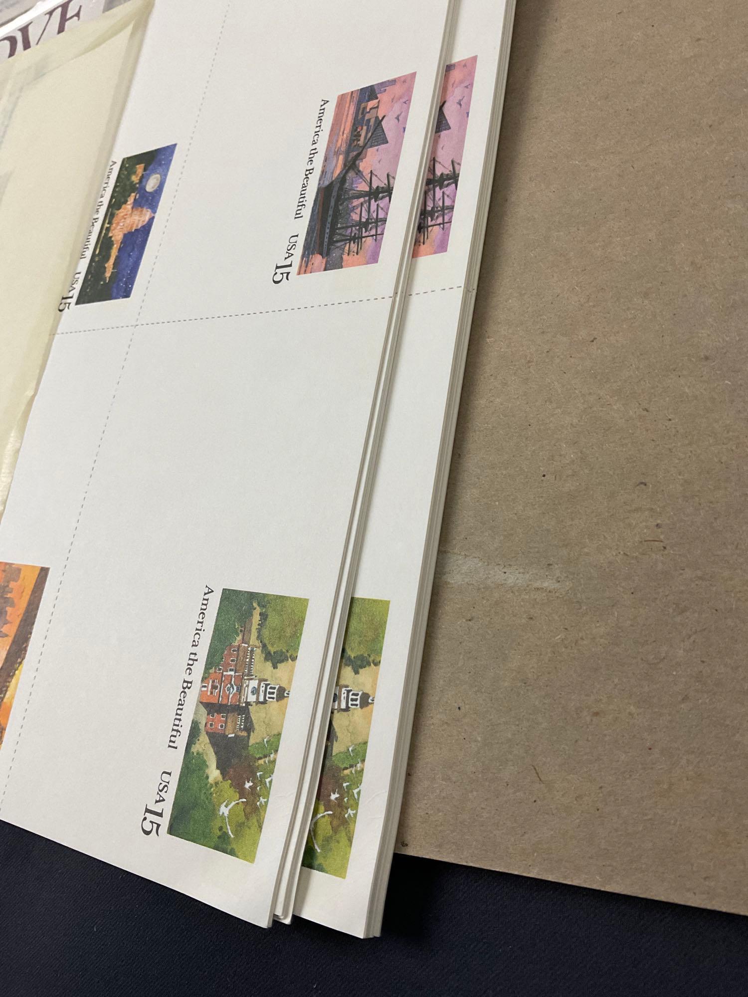 Loose First Day Cover Envelopes, roughly 100 packages & large amount of postcards