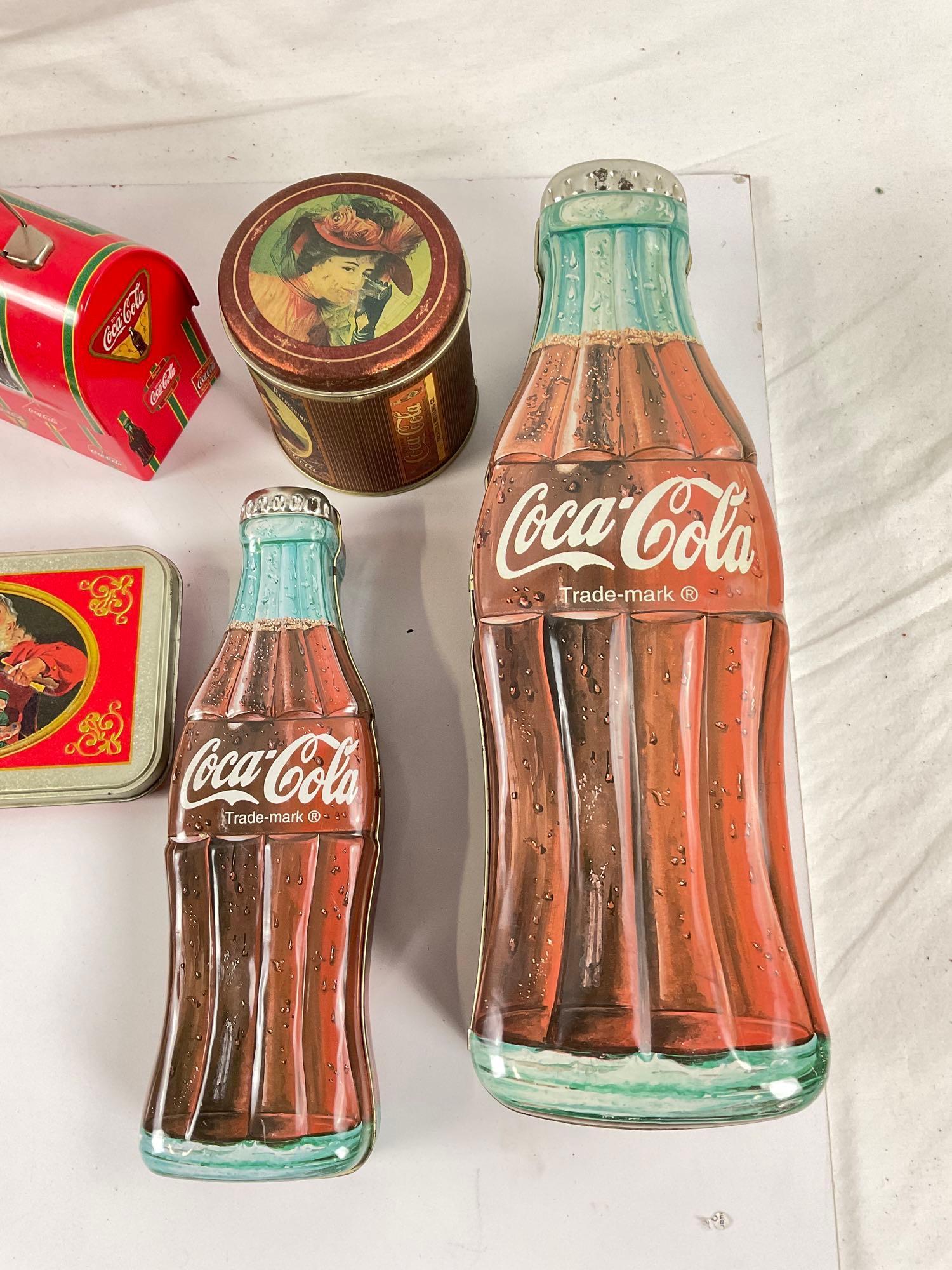 Small lot of COCA-COLA branded collectible tins, 12ct