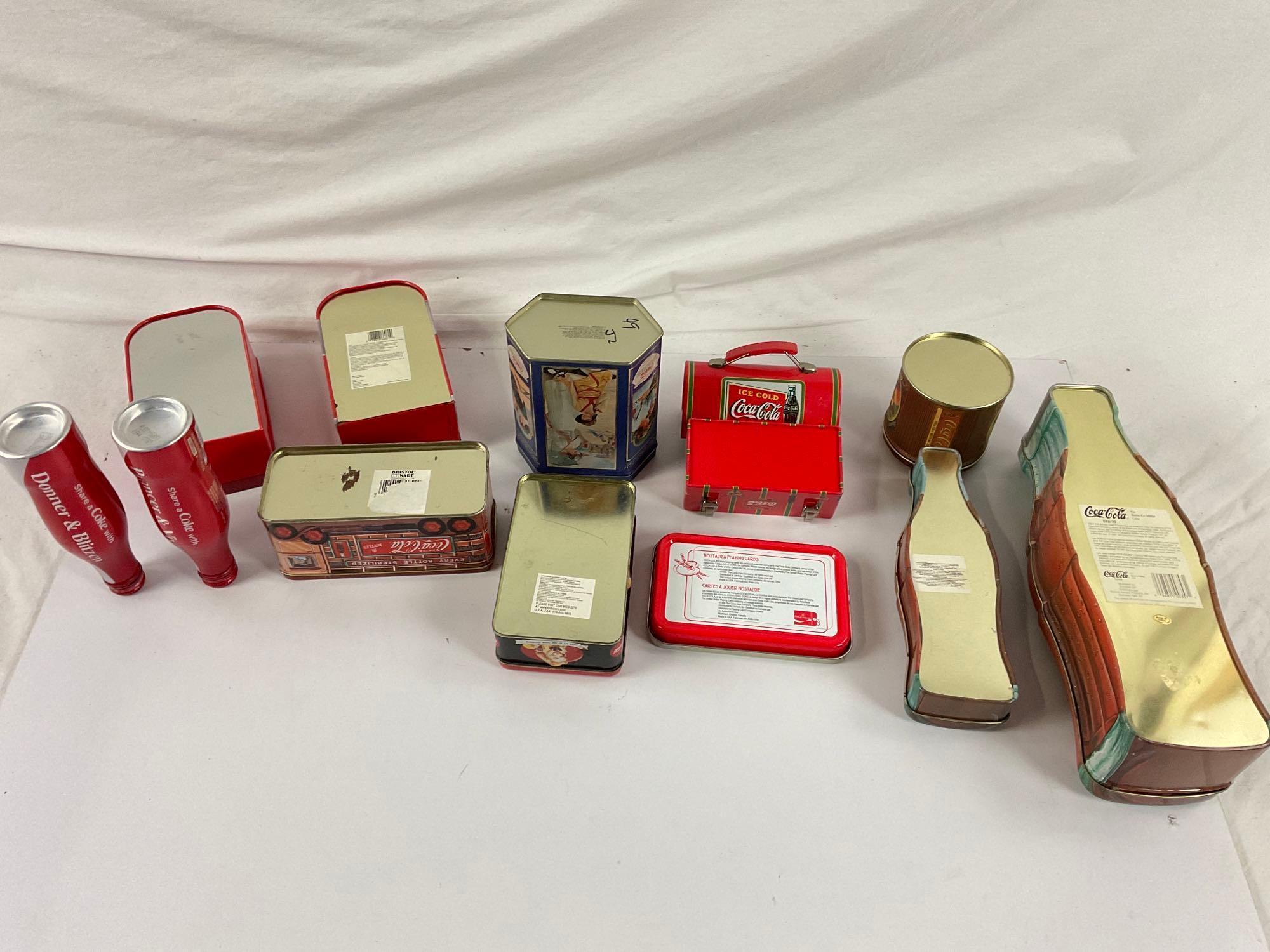 Small lot of COCA-COLA branded collectible tins, 12ct