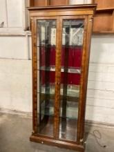 Mid century burled mahogany curio cabinet w/ glass shelves, mirrored back, and brass accents