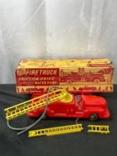 Vintage Marx plastic Fire truck with friction drive siren and water pump in box