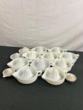 Assortment of 16 various vintage mainly milk glass juicers - most are Sunkist - See pics