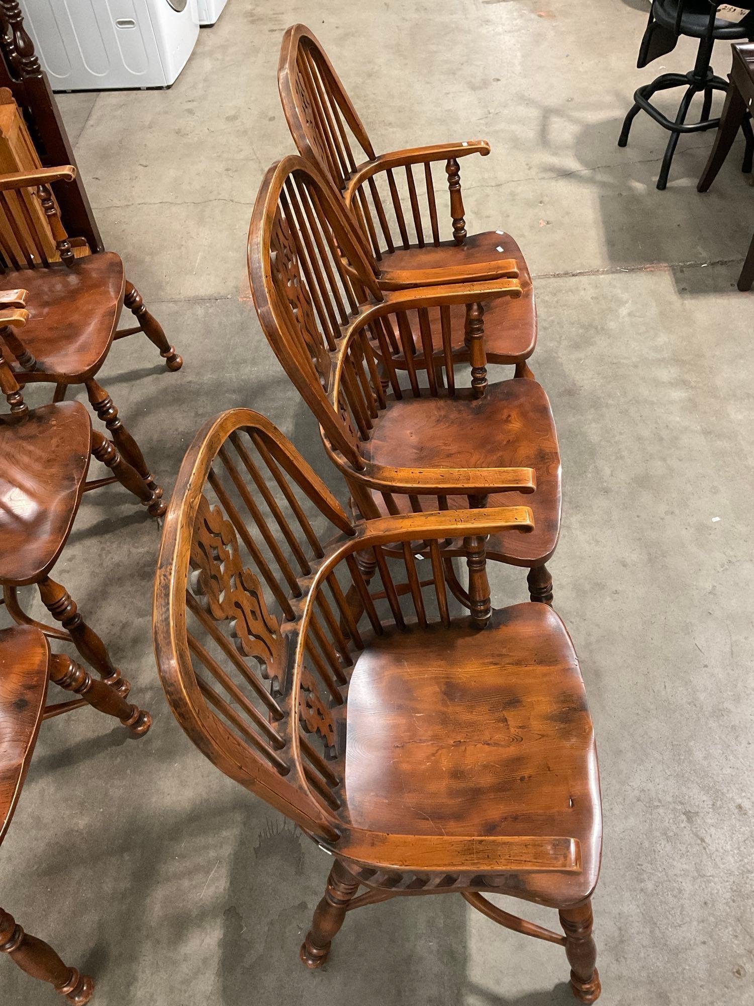 6 pcs Vintage English Oak Dowel Back Captain's Chairs. Measures 23" x 43.5" See pics.