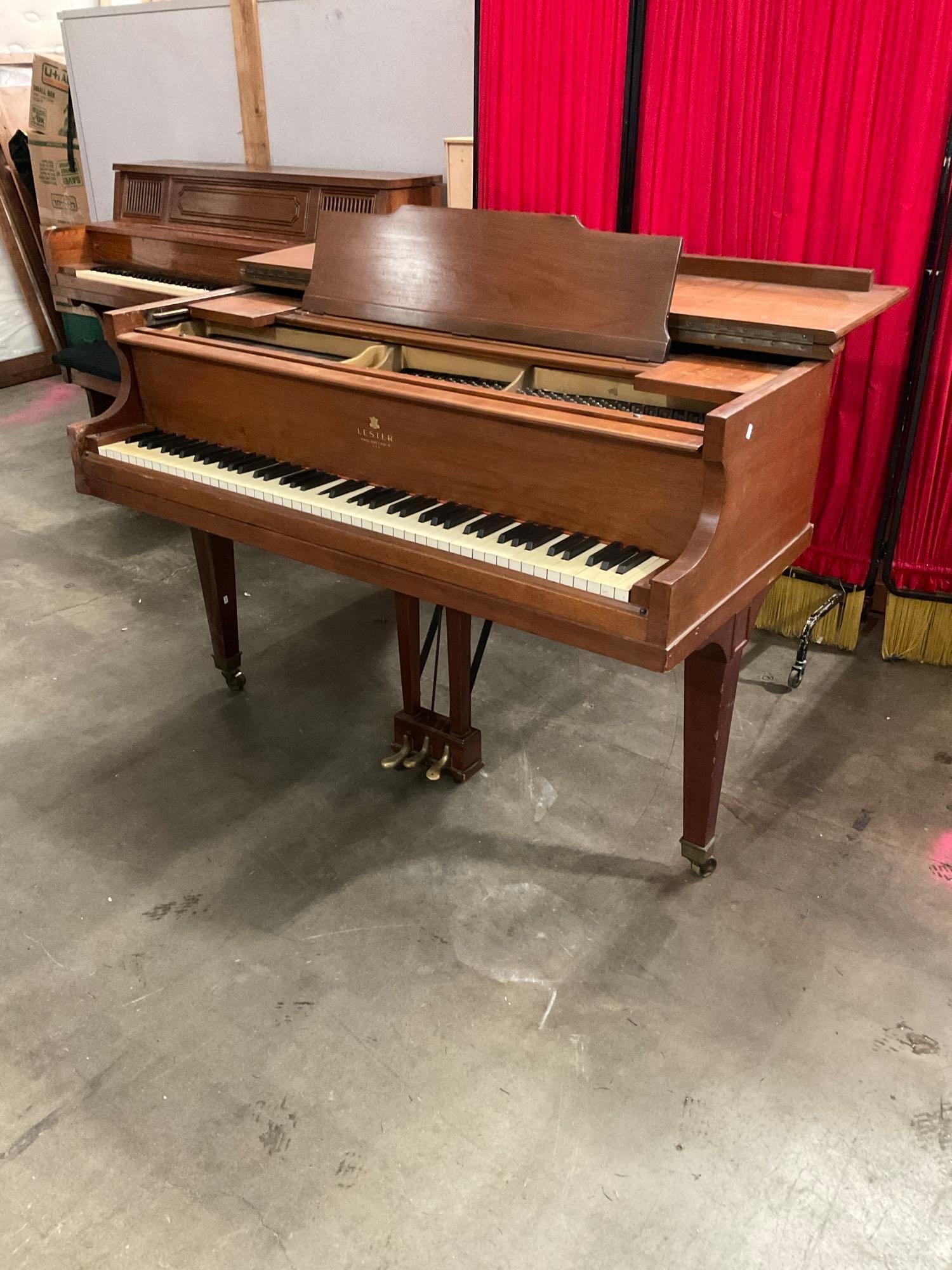 Vintage Lester Piano Co. Wheeled & Wooden Piano No. 98621. Measures 56" x 39" See pics.