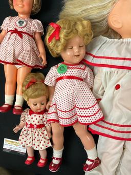 Set of 4 Vintage Dolls, a couple Shirley Temple Dolls, a couple with Red/White Dresses