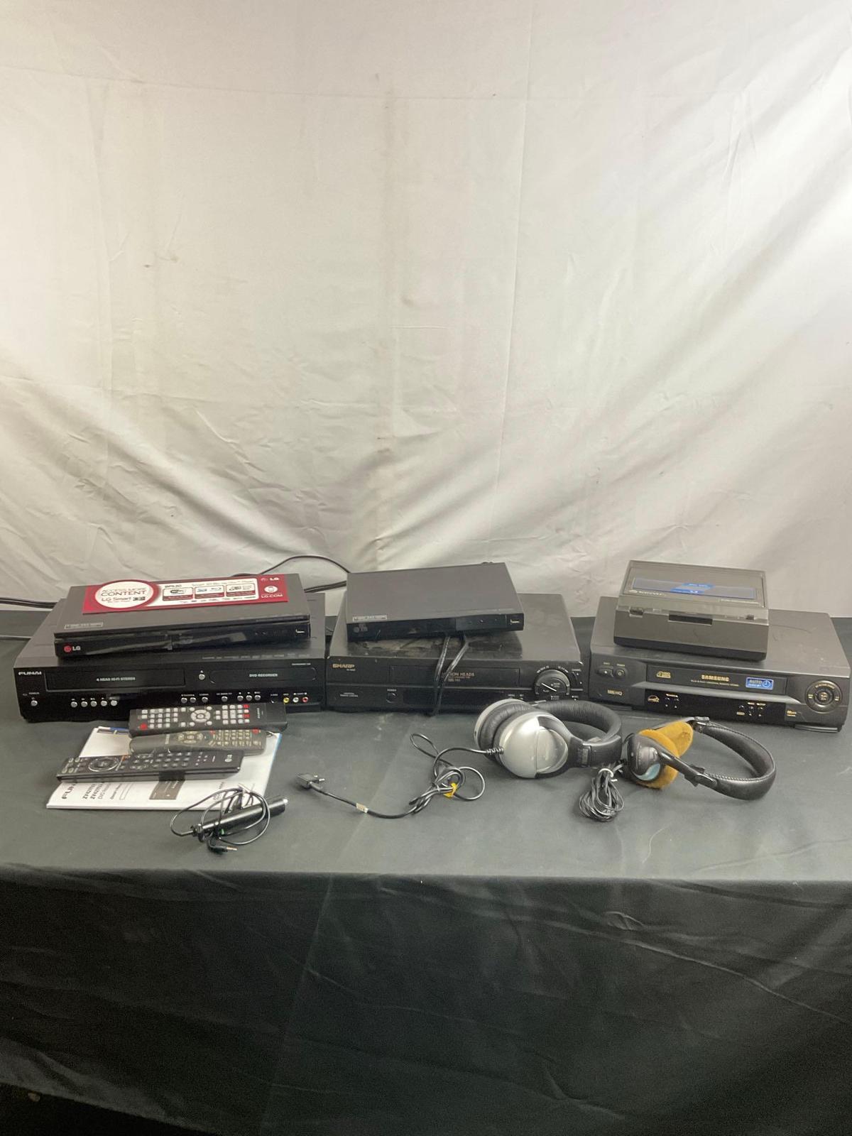 Collection of Blu Ray, DVD, & VHS Players, Recorders, & Rewinders + Remotes & Headsets