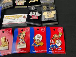 Assorted Disneyland Pins about 20, mostly USA 2004 Olympics, including a brass Medal