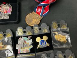 Assorted Disneyland Pins about 20, mostly USA 2004 Olympics, including a brass Medal