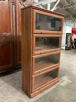 Vintage Wooden Barrister Bookcase w/ 4 Shelves & Folding Glass Fronts. Measures 34" x 61" See pics.