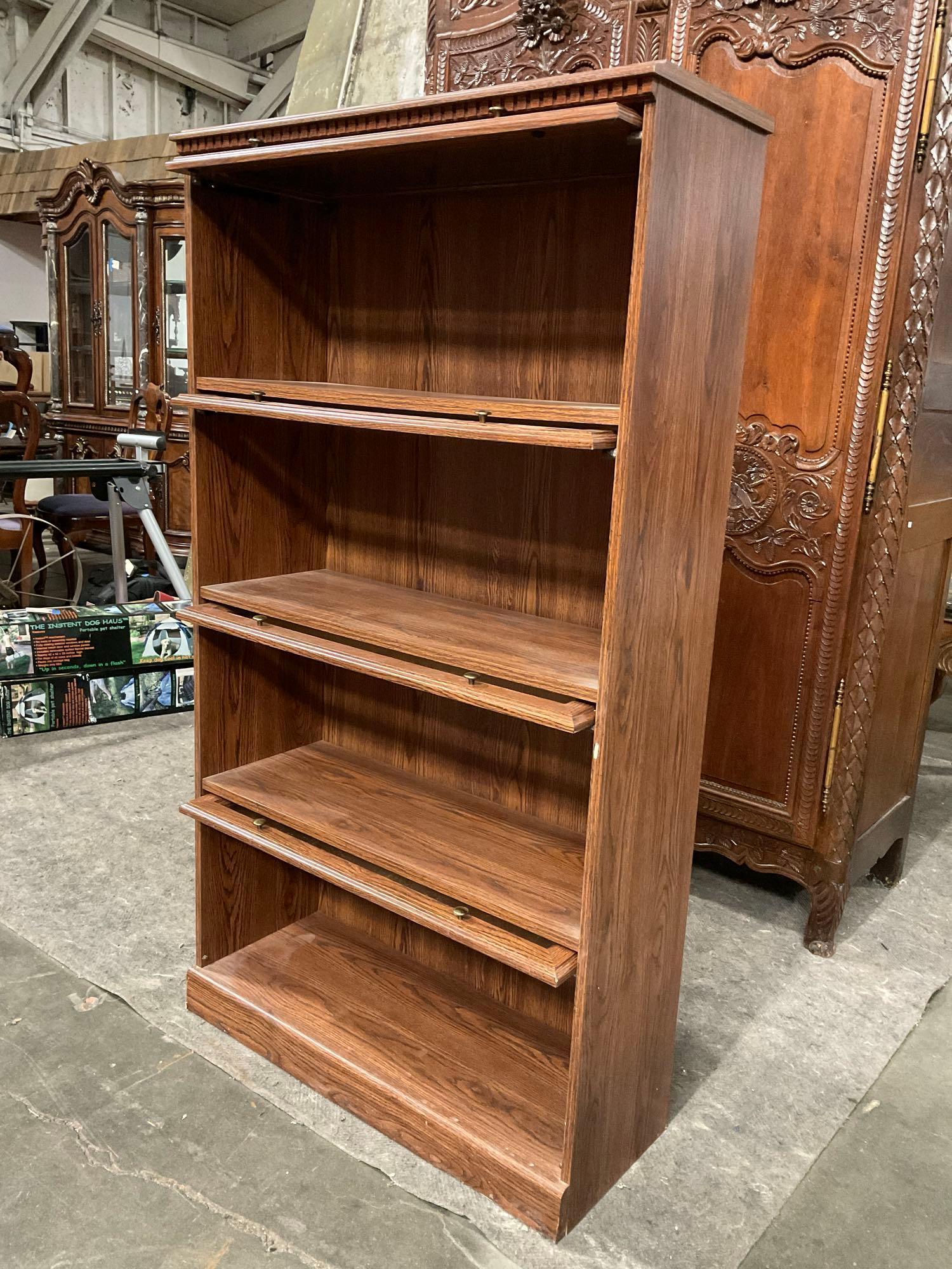 Vintage Wooden Barrister Bookcase w/ 4 Shelves & Folding Glass Fronts. Measures 34" x 61" See pics.