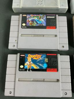 Collection of 16 SNES Game Cartridges incl. Several Star Wars, Starfox, Mario, & Marvel Titles