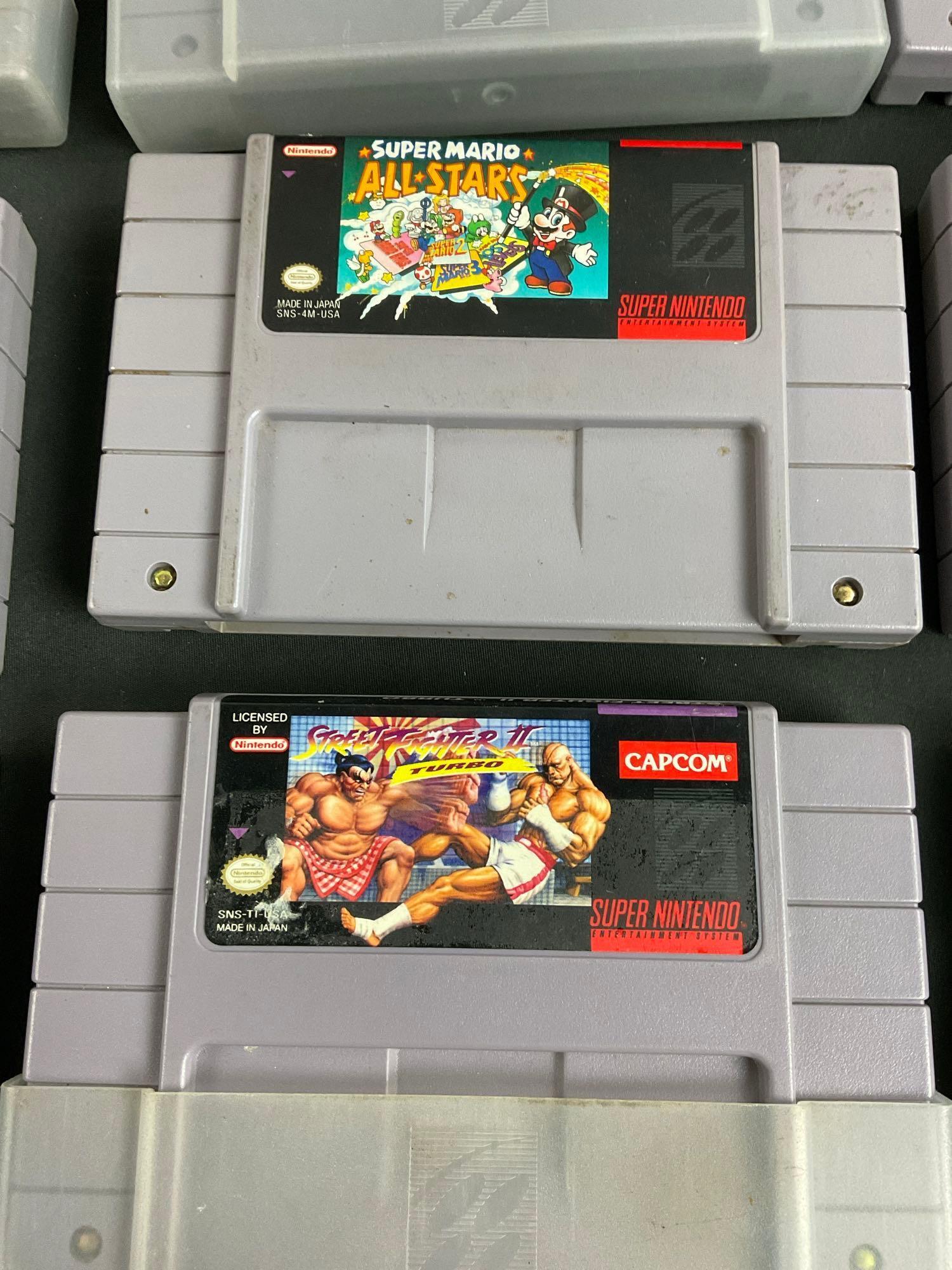 Collection of 16 SNES Game Cartridges incl. Several Star Wars, Starfox, Mario, & Marvel Titles