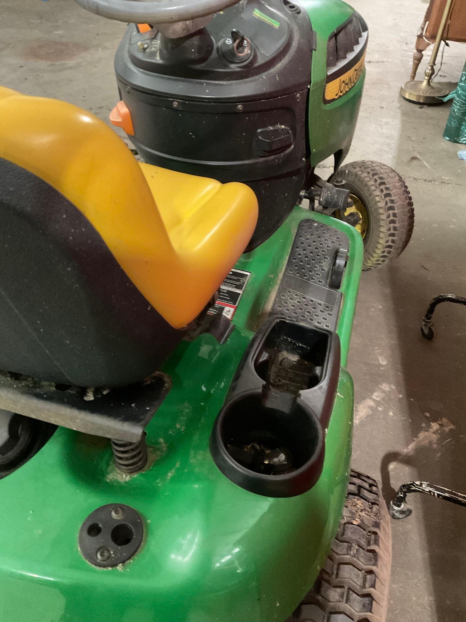 John Deere 19.5 HP D110 Riding lawn Mower, No deck See desc