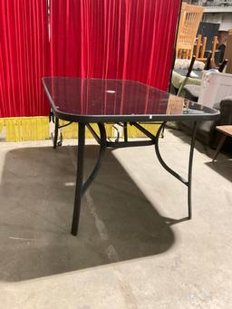 Nice Tempered Glass Metal Patio Table - In good Condition - Matches lot 55