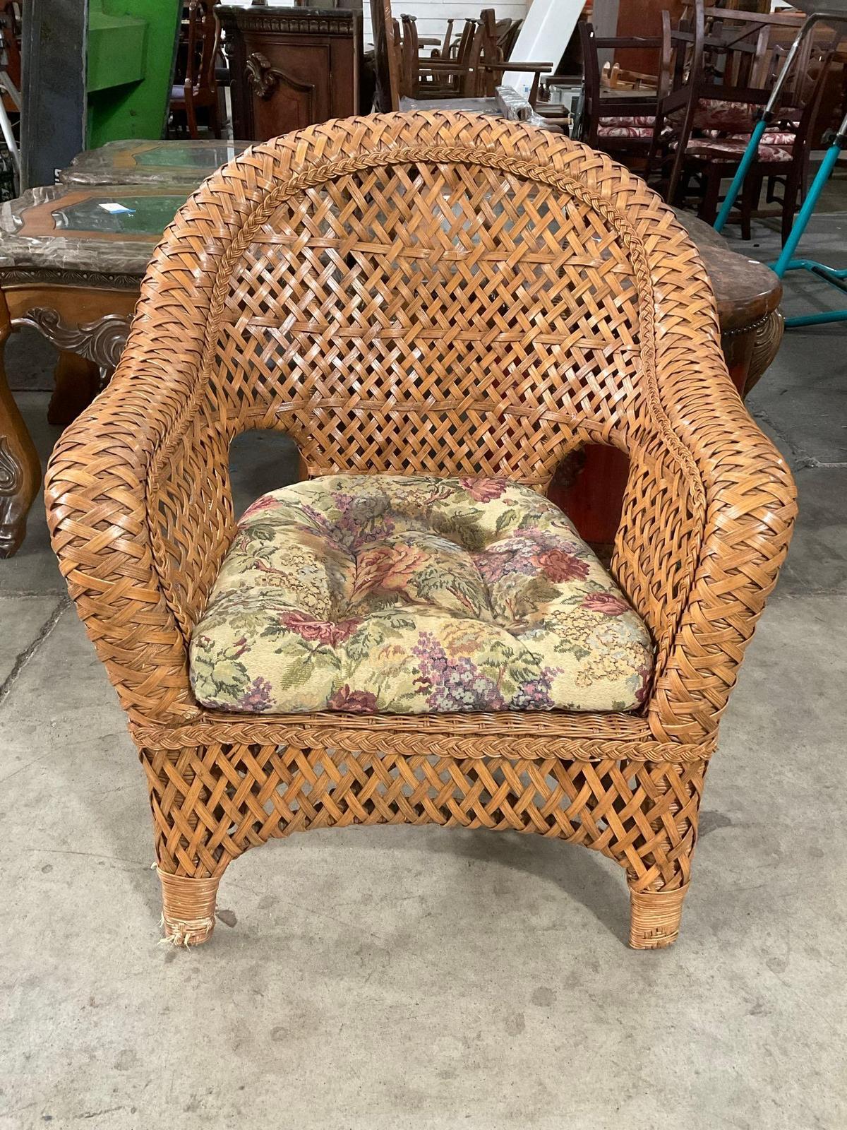 Vintage Woven Rattan Trellis Back Patio Armchair w/ Floral Cushion. Measures 31" x 36" See pics.