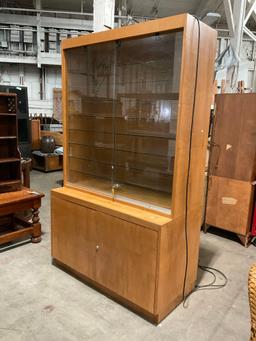 Vintage 2 Piece Locking Glass Fronted Illuminated Display Case w/ 8 Glass Shelves & Cupboard. See