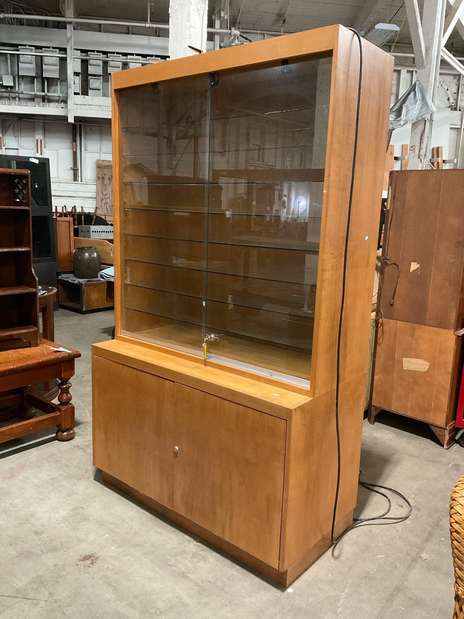 Vintage 2 Piece Locking Glass Fronted Illuminated Display Case w/ 8 Glass Shelves & Cupboard. See