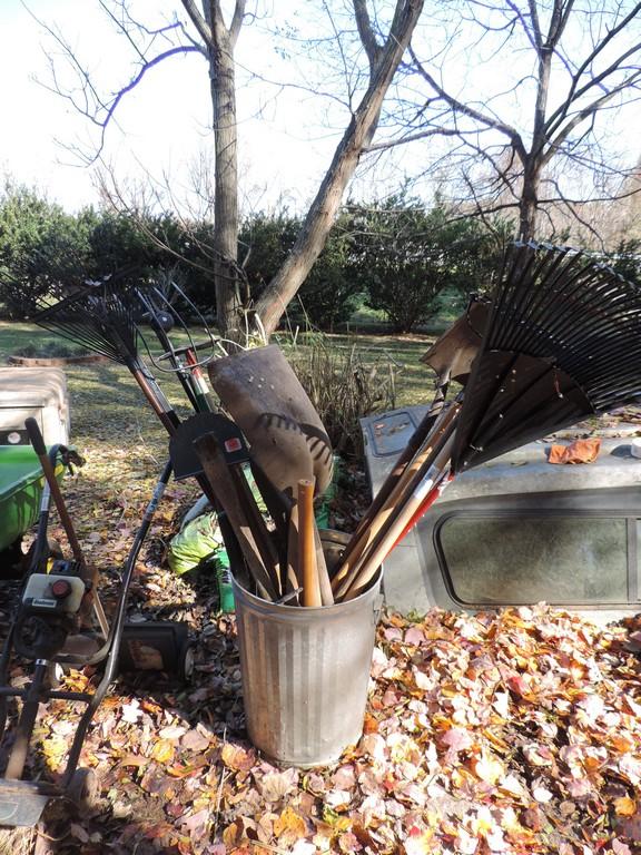 Trash Can Of Assorted Yard Tools