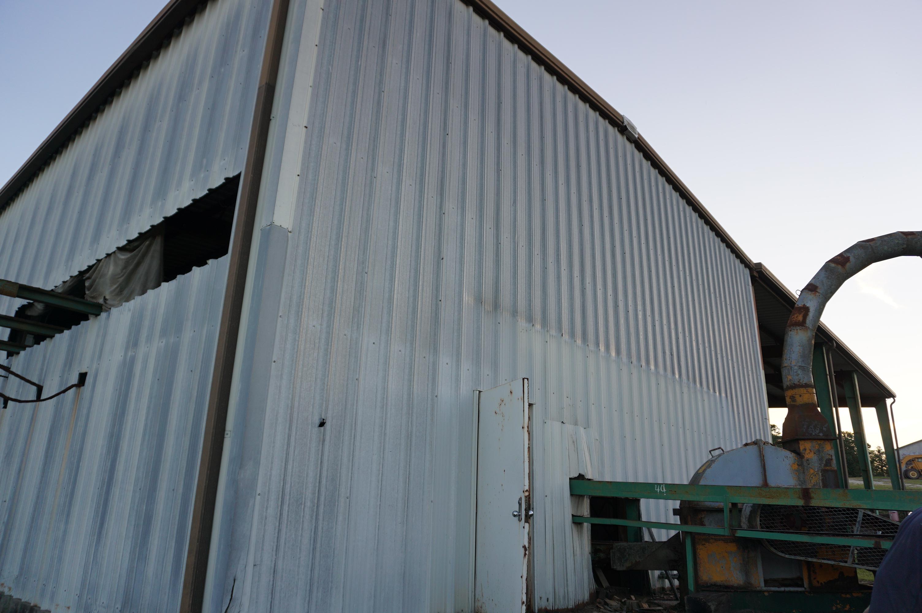 125' X 40' STEEL FRAME BLDG W/14' X 50' LEAN TO W/(2) 8' OVERHEAD DOORS