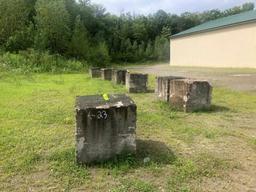 (11)3' X 3' Concrete Containment Blocks in Back Log Yard