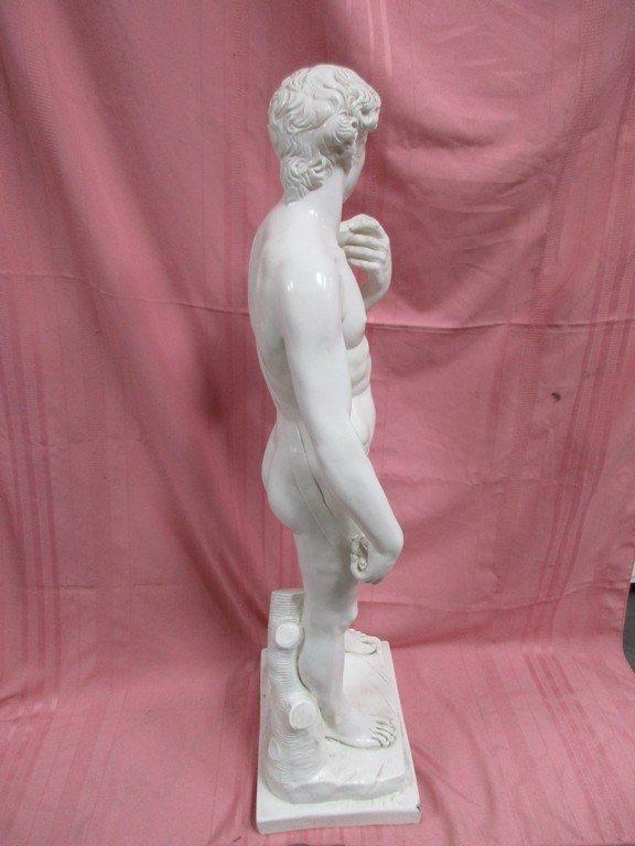 WHITE CERAMIC MAN SCULPTURE