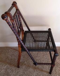 CARVED ANTIQUE SIDE CHAIR WITH CANE SEATING