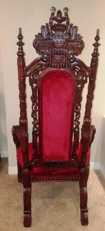 HEAVILY CARVED MAHOGANY THRONE CHAIR WITH CARVED LION HEADS