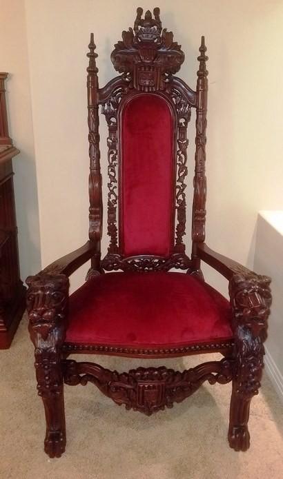 HEAVILY CARVED MAHOGANY THRONE CHAIR WITH CARVED LION HEADS