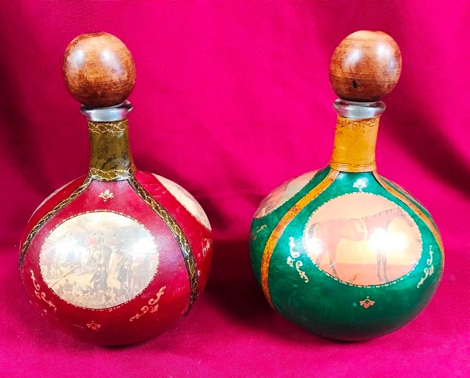 LOT OF TWO VINTAGE LEATHER DECANTERS