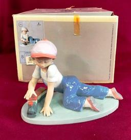 LLADRO BOY PLAYING WITH TRAIN W/ ORIGINAL BOX