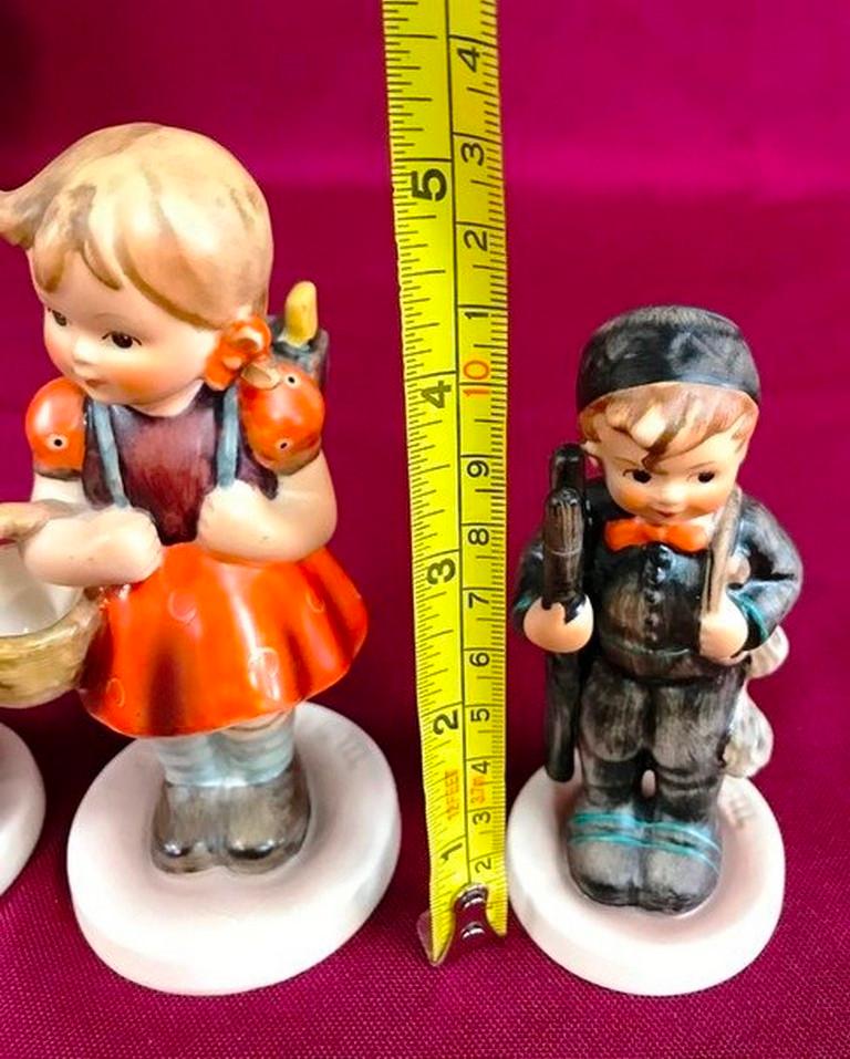 LOT OF THREE GERMAN HUMMEL/GOEBEL PORCELAIN FIGURINES