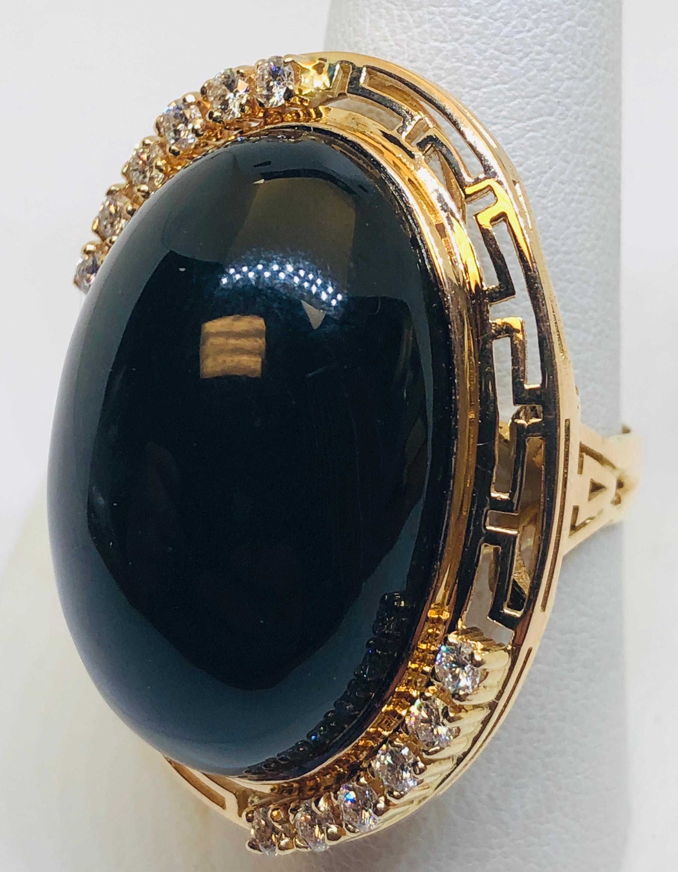 14KT YELLOW GOLD ONYX AND .75CTS DIAMOND RING 23.3GRS
