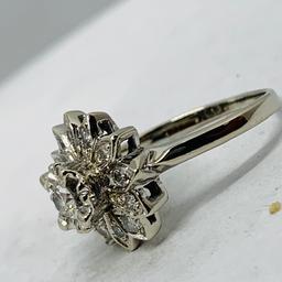 14KT WHITE GOLD 1.00CTS DIAMOND RING FEATURES .30CTS CENTER DIAMOND AND ANOTHER .70CTS AROUND