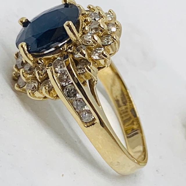 14KT YELLOW GOLD 3.63CTS BLUE SAPPHIRE  AND 1.30CTS DIAMOND RING